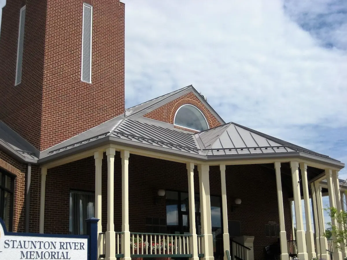 Skilled roofing craftsmen working on a residential roof in Decatur